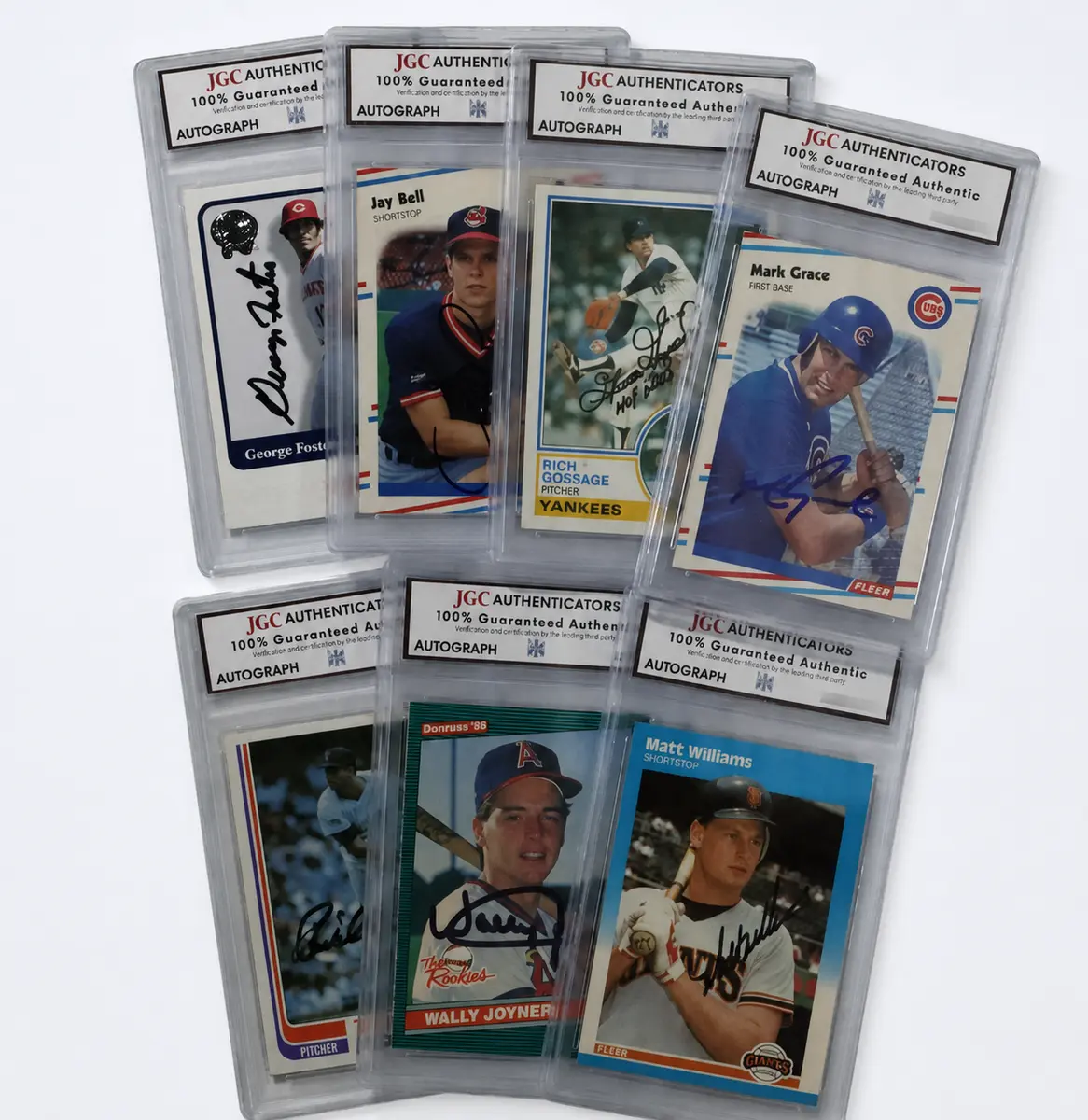 A selection of authenticated autograph baseball cards in protective holders
